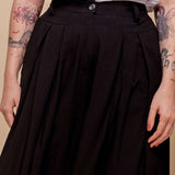 Calça Saia Alfaiataria com Botão - Preto - Uhnika