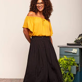 Calça Saia Alfaiataria com Botão - Preto - Uhnika