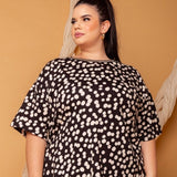 Camiseta Oversized com Fenda - Poá - Uhnika